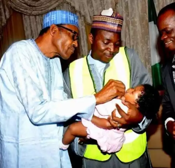 President Buhari Immunizing His Grandchild [See Photos]